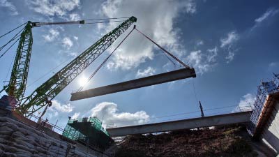 Time-lapse coverage of massive prefabricated girders installed over M2 Freeway