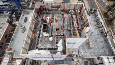 Time-lapse camera mounted on construction scaffolding