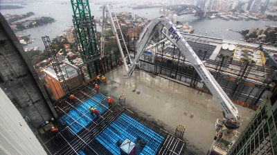 Camera view from scaffolding of cement pour on CBD building.