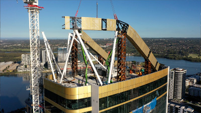 Large steel girders being installed during building construction