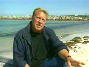 Graeme Beck conducting an on-location interview with actor Jack Thompson for The Movie Show on Foxtel in Sydney